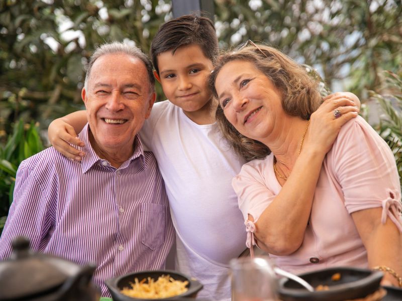 grandparents having a good time with their grandchild