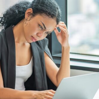 Woman concerned with laptop