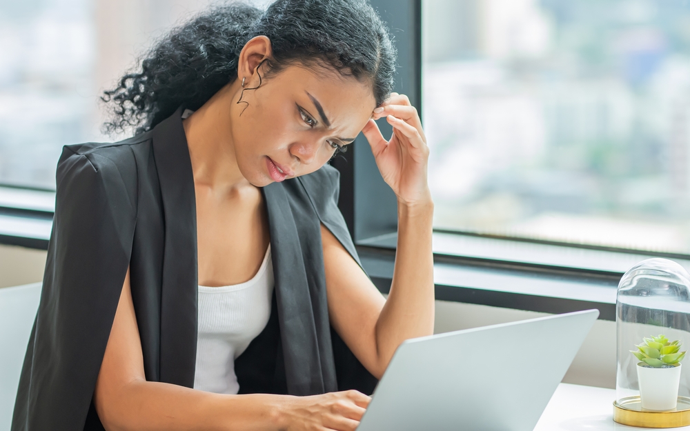 Woman concerned with laptop